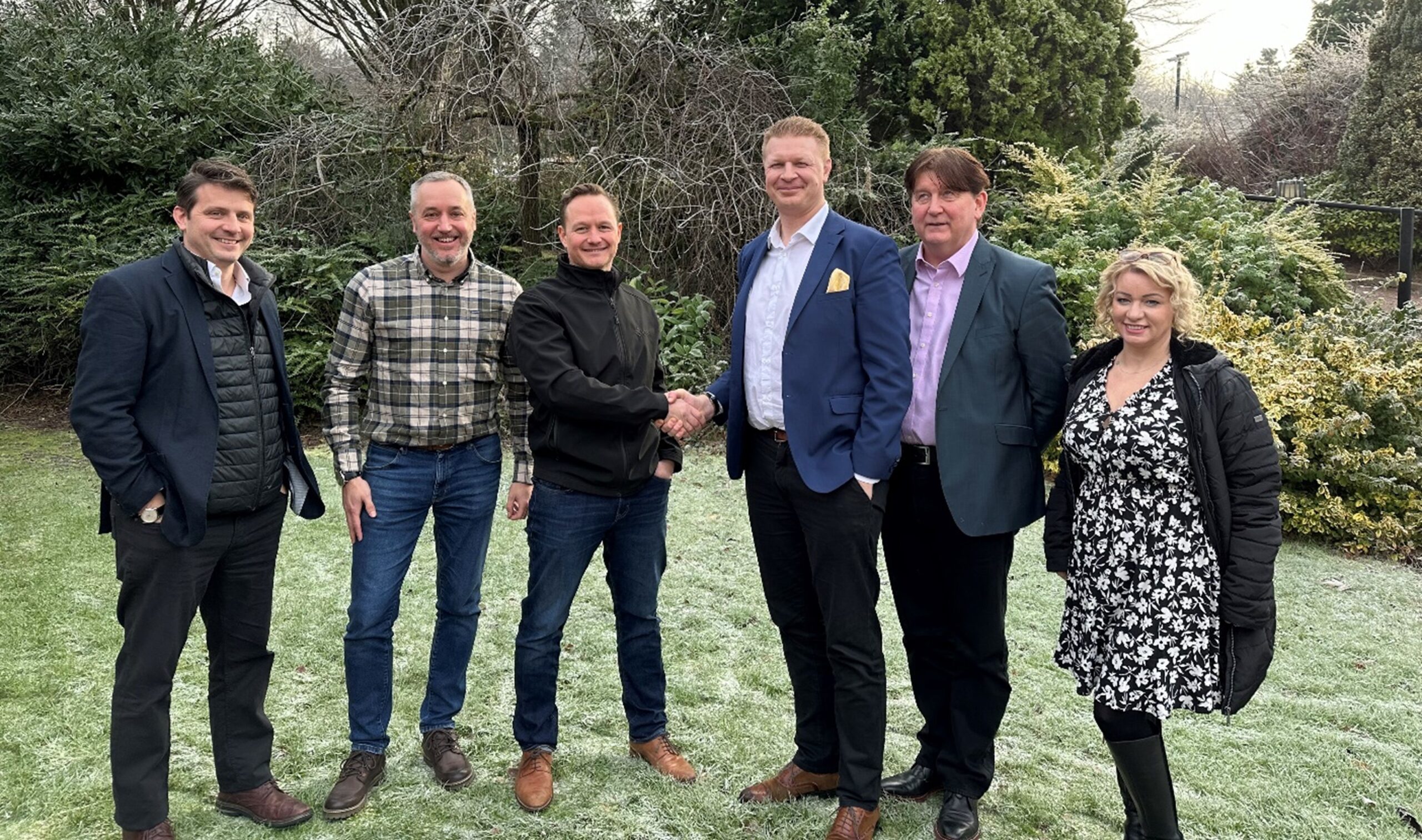 The team from Davis Site Security shake hands with VPS Group team